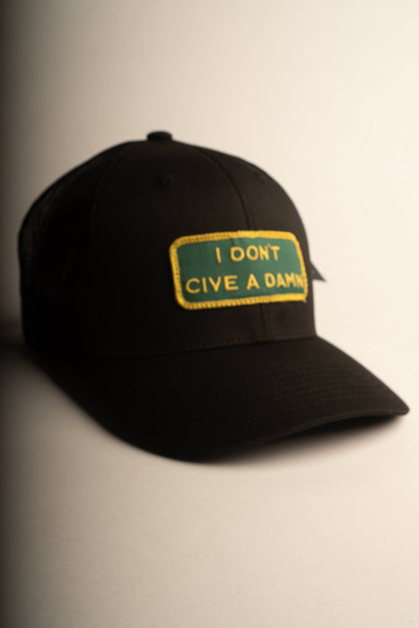 I DON'T GIVE A DAMN Black Trucker hat